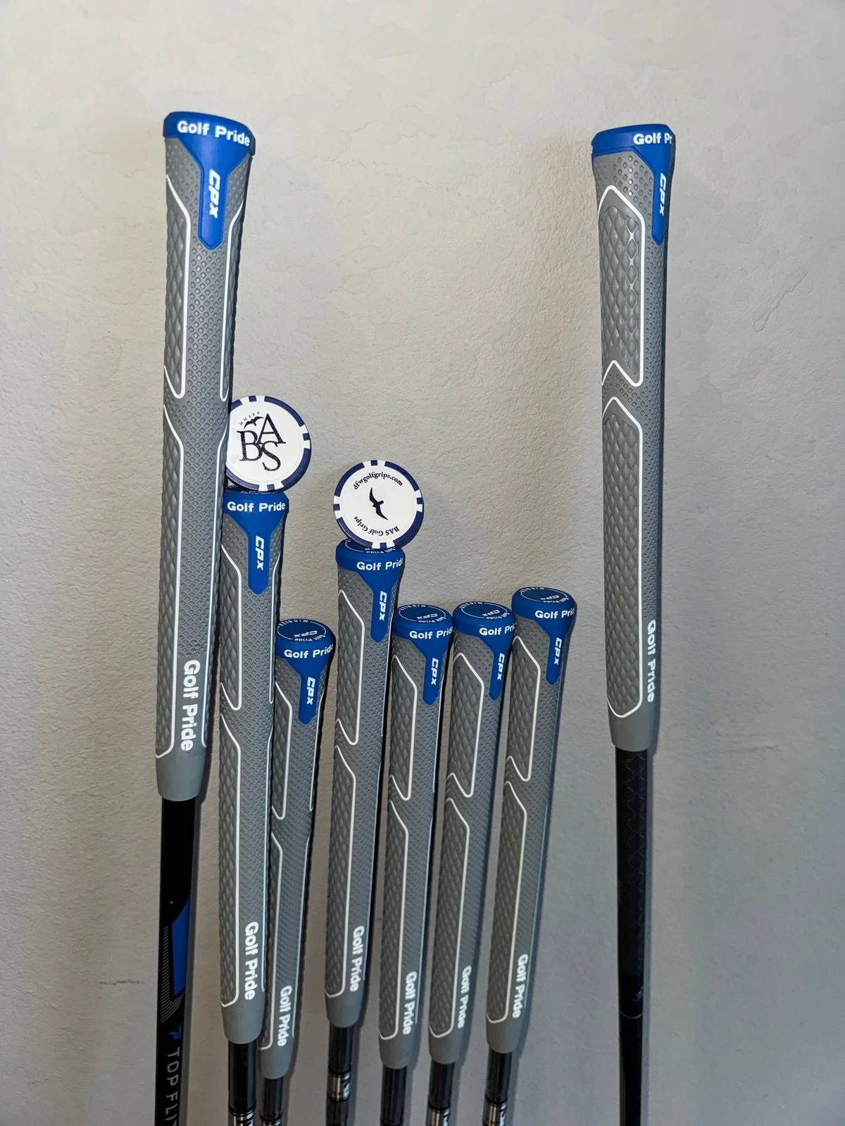 Completed BAS Golf grip installation on a full set of golf clubs